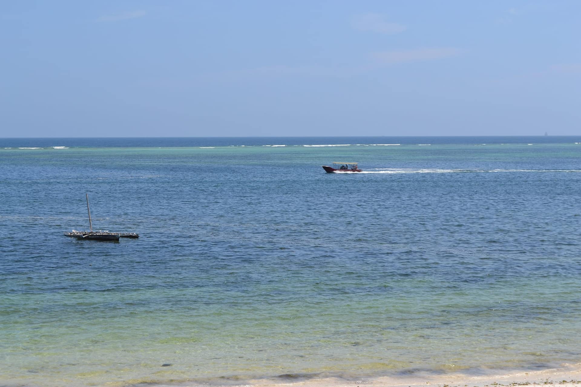 Fishing boats on the water off Nyali Beach in Mombasa
