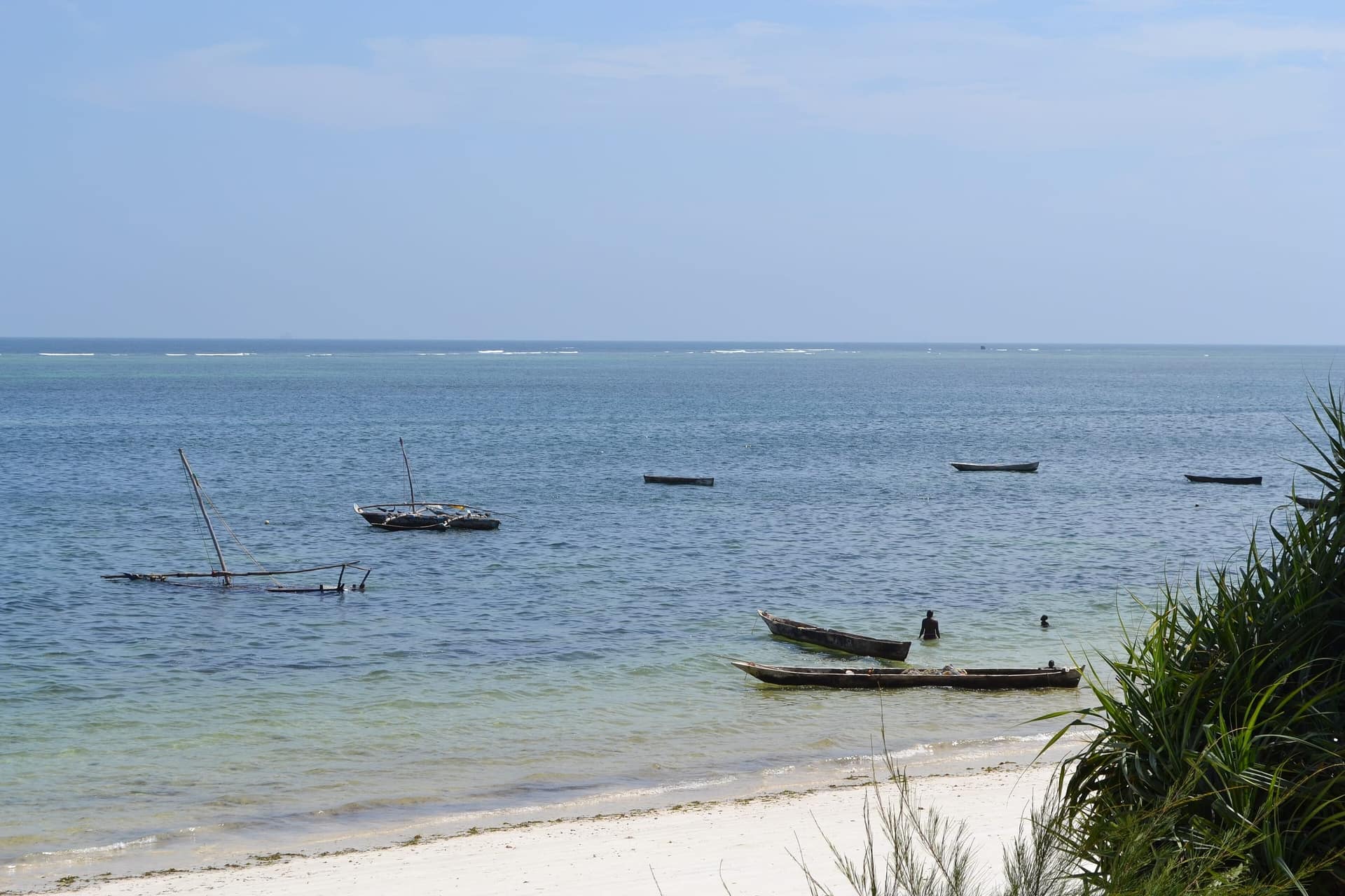 Fishing boats moored off Nyali Beach in Mombasa at high tide