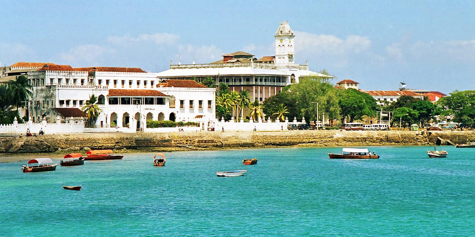 Boats in the turquoise harbour in front of Stone Town, Zanzibar